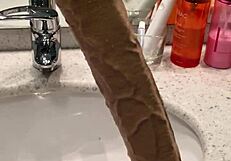 Long dildo dominates with intense pleasure