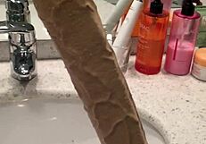 Long dildo dominates with intense pleasure