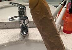 Long dildo dominates with intense pleasure