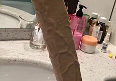 Long dildo dominates with intense pleasure