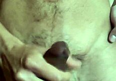 Gay man playing with his navel