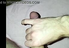 Young amateur massages his cock solo at home