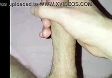 Young amateur massages his cock solo at home