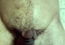 Gay man playing with his navel