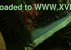 Latina couple enjoys sucking on a big candy cane together