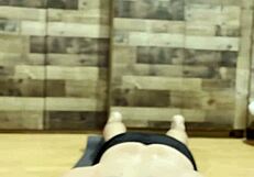 muscular bodybuilder stretches sexy body