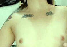 Naughty brunette plays with lollipop in wet dripping pussy