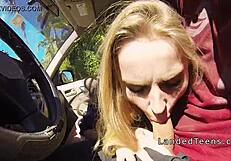 A man cynically gets oral satisfaction from an attractive young woman in a public place