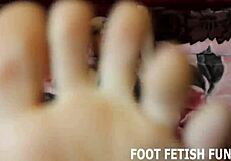 Intense slave cleans feet under femdom command