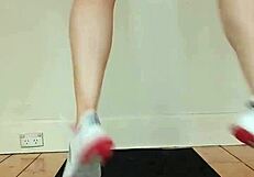 blonde teen in micro bikini shows off muscular body during intense cardio workout at gym