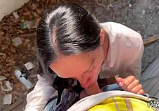 this skinny russian brunette gives a quick blowjob at a public photoshoot, ending with cum in her mouth