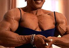 Muscular Women Biceps Flexing Power