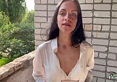 this skinny russian brunette gives a quick blowjob at a public photoshoot, ending with cum in her mouth