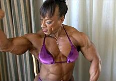 Muscular Women Biceps Flexing Power