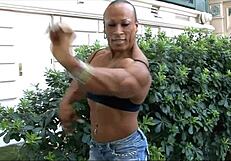 Muscular Women Biceps Flexing Power
