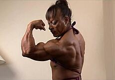 Muscular Women Biceps Flexing Power
