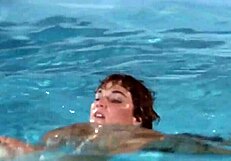 majorettes undress in sexy bikinis by the pool