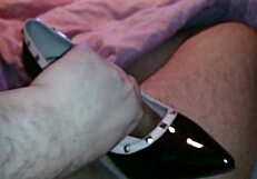 Italian babe fucks and cums inside high heels on bed