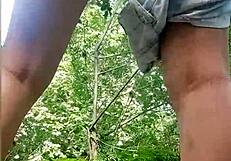 Young woman masturbates in the river unaware of the voyeur watching