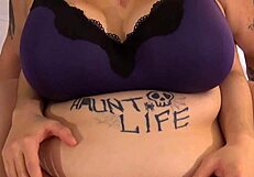 Two BBWs play with each other's bellies