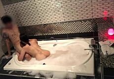 Yo, check this freaky Asian couple getting wild in a bubble bath! 🛁