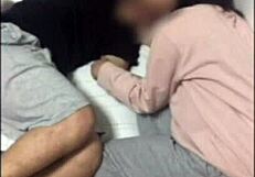 The passionate cohabiting couple indulges in intense asian sex with strong desires