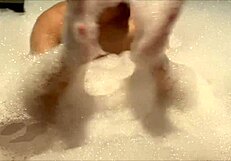 Yo, check this freaky Asian couple getting wild in a bubble bath! 🛁