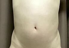 kinky japanese guy ties up his privates with string for thrill.