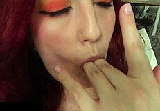 girl moans as she squirts from toy on her wet pussy and ass