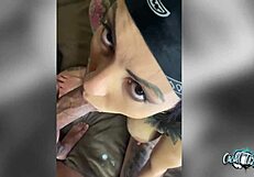 Tattooed call girl deep throats the man’s penis