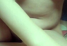 Asian babe vibrates pussy to intense wetness