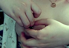 Beautiful Asian BBW indulges in icy nipple fetish play