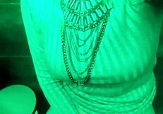 Slutty minx pissing and fondling pussy in the public toilet at the club