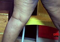 Caught ebony madam bent over fucking cucumber, big ass exposed