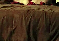 A husband watches as his horny wife virtuously pleasures herself with a massive dildo