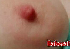 Curly redhead teen plays with toys in solo fun time