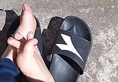 Feet Relaxing In The Sun Before A Professional Pedicure Treatment