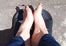 Feet Relaxing In The Sun Before A Professional Pedicure Treatment