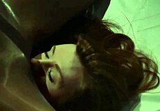 Pretty redhead lesbian babe fucks strapon in lingerie stockings