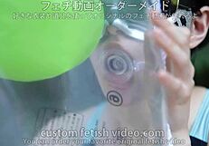 A woman inflating a float with air