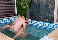 Is my girlfriend's friend bent over for doggystyle riding in the pool?