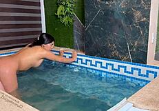 Is my girlfriend's friend bent over for doggystyle riding in the pool?