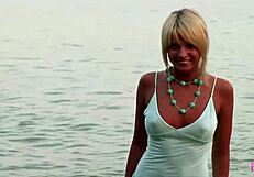 Beach beauty Arya rubs and fingers her pussy until she cums