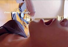 Female submissive gagged on huge dildo in throat fetish scene
