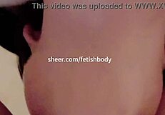 Female submissive gagged on huge dildo in throat fetish scene