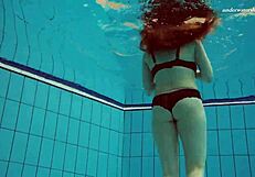 Czech chick vesta enters swimming pool naked. She bathes in the public shower.