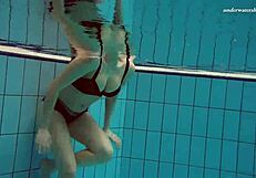 Czech chick vesta enters swimming pool naked. She bathes in the public shower.