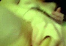 An amateur milf explores a big dildo passionately