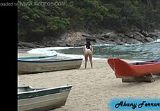 Exposing big tits and ass on the beach