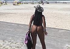 Exposing big tits and ass on the beach